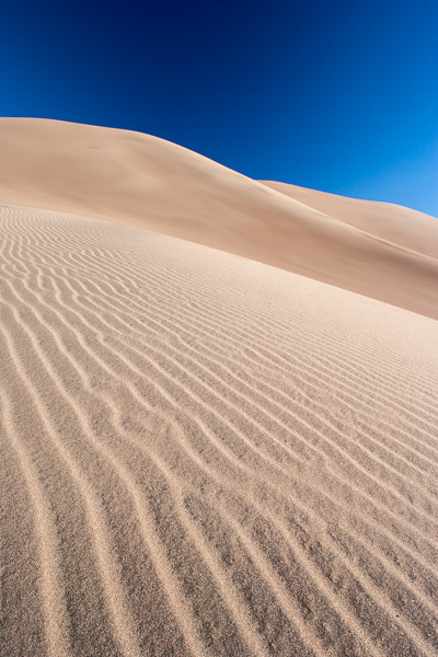 Abstract;Abstractions;Colorado;Drift;Dune;Great Sand Dunes National Park and Preserve;Heap;Hillock;Keepers;Mound;Patterns;Ridge;Sand;Stock categories;Textures;shapes;sky
