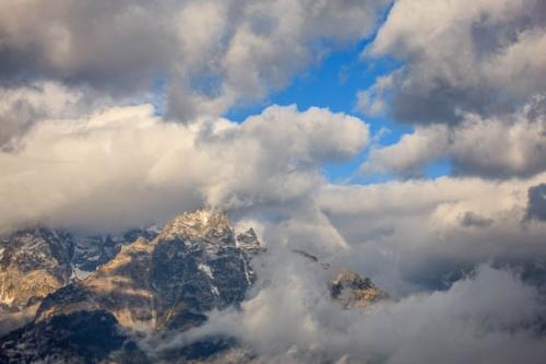Blue;Brown;Cloud;Cloud Formation;Clouds;Cloudy;Grand Tetons;Grand Tetons National Park;Jackson Hole;Mountain;Mountain Top;Mountainous;Mountains;Mountainside;Oneness;Pastoral;Peaceful;Pinnacle;Sky;Summit;Sunlight;Sunlit;Sunshine;Tan;United States;Weather;Wyoming;zen