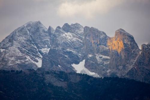 snow;Wyoming;Yellow;Summit;Mountainous;Mountain Top;Precipice;Mountainside;Gray;Grand Tetons;alpine glow;Peak;Mountains;Cliff;Bluff