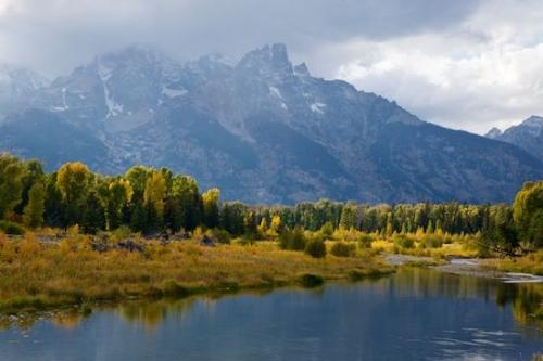 Gold;Horizontal;Cloud;water;Blue;Gray;Green;Cloud Formation;Valley;Fall;Stream;Peak;Woods;Wyoming;Mountainside;Summit;Weather;river;Precipice;Trees;Yellow;Mountains;Cliff;Tree;Grand Tetons;Forest;reflections;Mirror;Pinnacle;Mountainous;Bluff;Woodlands;Mountain Top;Sky;Wood;Mountain;Autumn