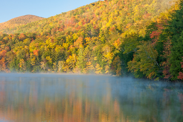 Autumn;Branches;Brown;Calm;Emerald Lake;Fall;Fallen Leaves;Fog;Forest;Forested;Gold;Healing;Health care;Healthcare;Leaf;Mirror;Mist;Mountain;Mountain Side;Mountains;Nature;New England;Pastoral;Sunlight;Sunshine;Tan;Timber;Timberland;Tree;United States;Vermont;Water;Waterscape;Wood;Woodland;Woods;Yellow;foggy;foliage;green;haze;hillside;lake;landscape;leaves;mist;misty;oneness;orange;peaceful;plants;pool;reflection;reflections;restful;serene;soothing;sunlit;tranquil;tree limbs;trees;zen