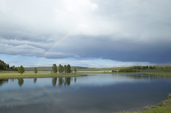 Yellowston National Park;Lake;Water;Pond;Pool;Reservoir;Lagoon;Rivers;River;Riverbed;Flowing;waterway;stream;creek;brook;Reflections;Reflection;Cloud Formation;Weather;Sky;Clouds;Cloud;Glen;Hollow;Canyon;Gorge;Cove;Valley;Rainbow