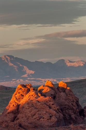 Bluff;Brown;Calm;Cloud;Cloud Formation;Clouds;Dusk;Gold;Healing;Health care;Healthcare;Image type;Landscape;Mountain;Mountain Side;Mountain Top;Mountainous;Mountains;Nature;Nevada;Pastoral;Peak;Photo specs;Pinnacle;Precipice;Range;Rock;Rock Face;Rock formations;Summit;Valley of Fire State Park;Warm Colors;Warm Palette;Warm Tones;Weather;Yellow;cliff;close of day;color;desert;dusk;evening;eventide;landscape;last Light;nightfall;oneness;orange;peaceful;red;restful;serene;sky;soothing;sun;sundown;sunset;tranquil;twilight;yellow;zen