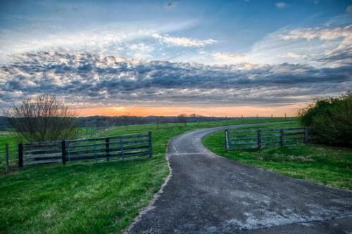 Agricultural;Blue;Cloud;Cloud Formation;Clouds;Cloudy;Farm;Fence;Field;Green;Landscape;Nature;Orange;Red;Road;Sky;Sun-up;Sunlight;Sunlit;Sunrise;Sunshine;Walkway;pasture;path;pathway;roadway