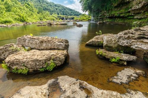 Blue;Bluff;Boulder;Boulders;Brown;Cascade;Cascading;Cliff;Cloud;Cloud Formation;Clouds;Falls;Fern;Forest;Geology;Green;Leaves;Plant;Pouring;River;Riverbed;Rock;Rock Face;Rock Formations;Rock Island;Rock Island State Park;Rocks;Rocky;Sky;Stone;Stones;Stream;Tan;Trees;Water;Waterfall;Waterfalls;Wet;Woods