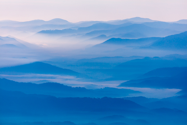 Blue;Blues;Calm;Cloud;Cloud Formation;Cool Colors;Cool Palette;Cool Tones;Fog;Forest;Great Smoky Mountains;Great Smoky Mountains National Park;Habitat;Healing;Health care;Healthcare;Hill;Minimalism;Mist;Mountain;Mountain Side;Mountainous;Nature;Obscured;Pastoral;Ridge;Summit;Sun-up;Tennessee;United States;blue;color;dawn;daybreak;foggy;haze;hillside;landscape;mist;misty;morn;morning;oneness;peaceful;restful;serene;silhouette;sky;soothing;sunrise;sunup;tranquil;zen