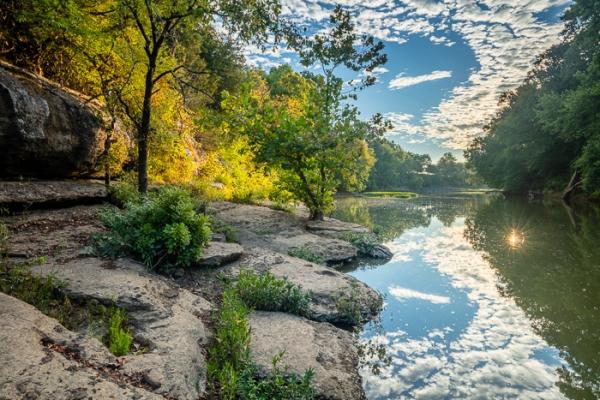Blue;Boulder;Boulders;Branches;Break of Day;Brown;Calm;Cloud;Cloud Formation;Clouds;Concepts;Cool Colors;Cool Palette;Cool Tones;Duck River;First Light;Flow;Forest;Gold;Green;Greens;Healing;Health care;Healthcare;Henry Horton;Henry Horton State Park;Leaves;Minimalism;Mirror;Nature;Oneness;Pastoral;River;Rock;Rock formations;Rocks;Rocky;State Park;Stone;Stones;Stream;Sun-up;Sunlight;Sunshine;Tan;Tennessee;Tree;United States;Water;Waterscape;Woods;Yellow;color;dawn;daybreak;flowing;landscape;limbs;morn;morning;peaceful;plants;reflection;reflections;restful;river bank;serene;sky;soothing;sunlit;sunrise;sunup;tranquil;tree;tree limbs;trees;trunk;zen