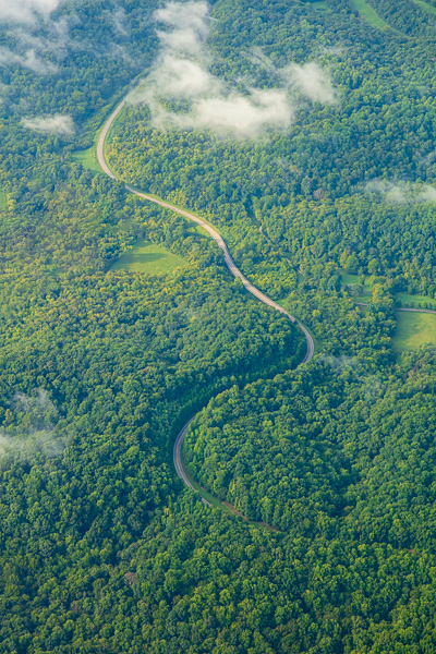 Aerial;Airplane;Calm;Cloud;Cloud Formation;Clouds;Cloudy;Forest;Forested;Habitat;Healing;Health care;Healthcare;Highway;Hill;Nature;Pastoral;Roadway;Sunlight;Sunshine;Timber;Timberland;Weather;Wood;Woodland;Woodlands;Woods;green;hillside;landscape;oneness;peaceful;restful;road;serene;sky;soothing;sunlit;tranquil;trees