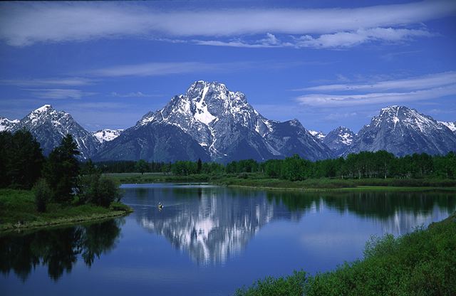 Ledge;Mountain;Cliff;Precipice;Peak;Mountain Top;Rock Formations;Rocks;Boulder;Nature;Vertical;High;Power;Powerful;Scenic View;Scenics;Snow;Summit;Pool of Water;Reflections;Water;Sky;Clouds;River;Lake;Calm