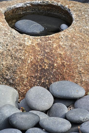 Pebble;Weathered;Aged;Worn;Textures;Shapes;Patterns;Abstractions;Abstract;Striation;Stone;Rock;Boulder;Geology;Geological;Rock formations;Rocks