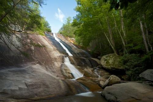 Bluff;Cascading;Tree;Cool;Flow;Waterfall;Rocks;Rock Face;Spilling;Brown;Rock Formations;Ledge;Vertical;Trees;Waterfalls;Water;Pouring;Horizontal;Falls;Boulder;Rock;White;Blue;Chute;Boulders;Tan;Streaming;Timberland;Cloud;Stream;Stone Mountain Falls;Wet;Woodlands;Stone Mountain State Park;Falling;Clouds;Green;Elkin;North Carolina;Forest