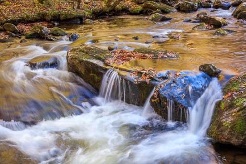 Blue;Boulder;Boulders;Brown;Cascade;Cascading;Chute;Creek;Fallen;Fallen Leaves;Falling;Falls;Flow;Foliage;Gold;Leaf;Leaves;Mirror;Moss;Oneness;Orange;Peaceful;Pouring;Rapids;Reflection;Reflections;Ripple;River;Rock;Rock Formations;Rocks;Spilling;Stone;Stones;Stream;Streaming;Tan;Water;Waterfall;Waterfalls;Yellow;flowing;river bank;zen