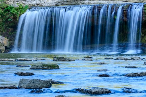 Blue;Boulder;Boulders;Calm;Cascade;Cascading;Chute;Concepts;Falling;Falls;Flow;Geology;Healing;Health care;Healthcare;Indiana;Mill Creek;Nature;Oneness;Pastoral;Pouring;River;Rivers;Rock;Rock formations;Rocks;Spilling;Stone;Stones;Stream;Streaming;United States;Water;Waterfalls;Waterscape;color;flowing;landscape;peaceful;rapids;restful;serene;soothing;tranquil;waterfall;waterway