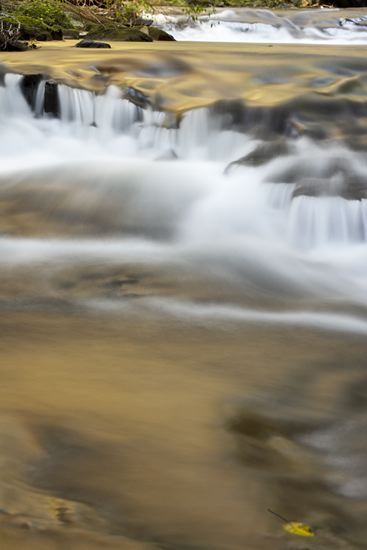 Reflections;Reflection;Waterfalls;Spilling;Falling;Chute;Falls;Cataract;Spray;Cascading;Cascade;Flow;Wet;Cool;Pouring;Flowing;Water;Stream;Waterfall;Textures;Shapes;Patterns;Abstractions;Abstract